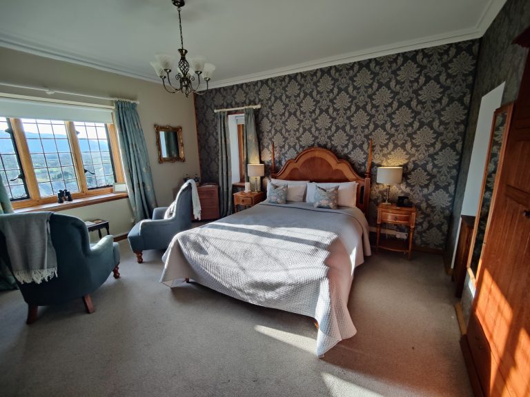 Hardwood frame Luxury Bedroom and two armchairs