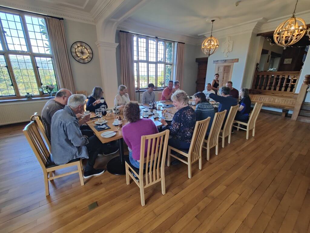 Informal meal with 16 people sat for dinner