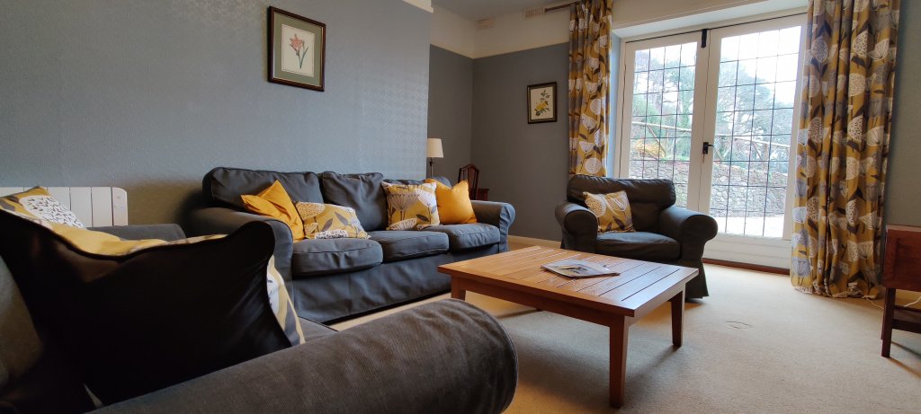 communal lounge with sofa and TV